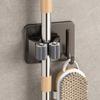 Clip para mopa color gris pistola para colgar en la pared del baño, acero inoxidable, colgador fijo para escoba, gancho de pared multifunción sin perforación