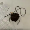 Bolsa Cubo con Borlas Estilo Coreano Otoño 2026 Bolso Cruzado de Hombro Único Color Sólido de Moda Bolso de Cuerda Estilo Relajado Nicho