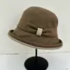 2026 Estilo Coreano Nuevo Sombrero de Pescador con Ala Enrollada Otoño/Invierno para Mujer Protección Solar Cortavientos para Exteriores Sombrilla Versátil Sombrero Cubeta para Mujer