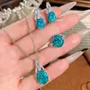 Ambiente Romántico Luz Colgante Sabor Menta Paraíba Moda de Lujo Diamante Aguamarina Diamante Huevo de Paloma Anillo de Diamante Conjunto para Mujer