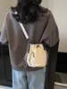 Nova bolsa de balde transfronteiriça, bolsa versátil da moda com cordão estilo japonês para mulheres, bolsa de ombro casual de alta qualidade para viagens
