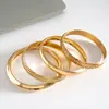 Conjunto de Quatro Peças de Pulseiras Circulares Vazadas Estilo Metal Europeu e Americano, Pulseiras Geométricas Simples da Moda Transfronteiriça, Joias Exageradas de Alta Qualidade