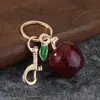 Llavero de Manzana con Purpurina Colgante para Bolso Resina Adorno de Fruta Creativo Venta Caliente Transfronteriza Moda Accesorio para Bolso de Mujer