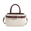 Bolsa feminina fashion, casual e única, design de nicho, textura simples, bolsa de ombro cruzado, bolsa quadrada pequena da primavera de 2026