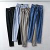 Pantalones lápiz ajustados asimétricos con hebilla oblicua de otoño para adelgazar y realzar la cadera, jeans ajustados de talle alto para adelgazar