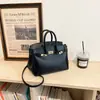 Elegante bolso de trabajo de color liso de gran capacidad, bolso cruzado, estilo popular en línea, bolso de mano versátil para mujer, disponible en stock