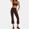 Conjunto de dos piezas para mujer estilo europeo y americano, con tirantes finos y pantalones acampanados cropped de cintura alta, sensación nude, fitness casual para correr, venta al por mayor