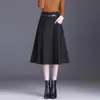 Falda midi de línea A de color liso a la moda para mujer, nueva colección otoño 2026, de cintura alta, que disimula el abdomen, de corte holgado, casual y con un dobladillo ancho