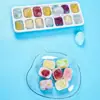 Venta al por mayor del fabricante molde de silicona para cubitos de hielo de fondo suave de 14 rejillas bandeja de hielo molde para cubitos de hielo de helado casero DIY con tapa