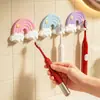 Soporte de Cepillo de Dientes Adhesivo de Dibujos Animados Nube Arcoíris al por Mayor en Stock del Fabricante, Estante de Almacenamiento de Cepillos de Dientes de Alta Calidad Montado en la Pared sin Taladro