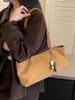 Bolso grande de alta costura vintage para mujer, nuevo bolso de hombro texturizado de nicho para principios de otoño de 2026, bolso simple de axila
