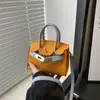 Bolsa para Niños 2024 Nueva Moda Europea y Americana Patrón de Lichi Mini Bolso Kelly Niñas Bolso Cruzado de Color Contrastante Bolso Rojo para Mujer