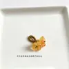 Precio mayorista directo de fábrica pulsera hecha a mano pulsera con colgante diy accesorios pequeños deslizantes colgante de garra de gato lindo Joker