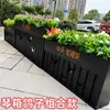 Caja de flores de acero inoxidable para exteriores combinación soporte de flores de hierro departamento de ventas valla de plantación verde partición canaleta para flores cama de flores exterior de restaurante