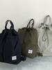 Mochila transfronteriza de ocio ligera multifuncional para hombres y mujeres 2025 nueva moda portátil para viajes mochila con cordón de comercio exterior