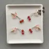 Precio mayorista directo de fábrica pulsera hecha a mano pulsera con colgante diy accesorios pequeños deslizantes colgante de garra de gato lindo Joker