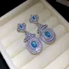 Pendientes de aro con colgante ovalado de circón de aguja de plata transfronterizos europeos y americanos, pendientes de lujo ligero de alta gama, accesorios para la oreja modernos y exquisitos