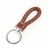 Llavero de cuerda de cuero tejido llavero creativo colgante colgante de pareja llavero cuerda colgante de bolsa de cuerda al por mayor