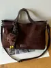 Bolsa de Ombro Cruzada Versátil Feminina Grande Capacidade Suede Modelo Novo 2026 para Uso Diário Vintage