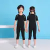 Conjunto de fitness de manga curta de secagem rápida transfronteiriço para esportes ao ar livre, unissex e infantil, roupa térmica de treinamento, respirável e justa ao corpo