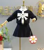 2026 Ropa de Otoño e Invierno para Niñas Estilo Coreano Conjunto de Falda de Punto Pequeño Estilo Chanel Suéter y Falda Corta para Bebé Conjunto de Dos Piezas 6802