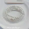 Pulseira de Pérolas Empilhável Francesa Suave de Múltiplas Camadas Toque de Luxo Três Círculos Pulseira de Luxo Leve Elástica Simples Versátil para Mulheres
