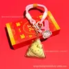 Chaveiro Criativo Zongzi HelloKitty Desenho Animado Fofo Gato KT Zongzi Pingente Dourado Festival do Barco-Dragão Presente Venda por Atacado