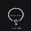 Pulsera de Moda de Venta Caliente Transfronteriza 2026 con Diamantes y 26 Letras, Pulsera de Perlas de Imitación Ovaladas, Disponible para Venta al por Mayor para Mujeres