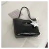 Bolso pequeño vintage de alta calidad para mujer, nuevo bolso cruzado de moda versátil 2026, bolso tipo cubo de mano súper popular