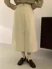 La Nueva Falda Midi de Color Sólido con Botones, Holgada, con Abertura, Corte en A, para Mujer, Modelo Egg 2026 de Dongdaemun, Corea del Sur
