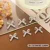 Nuevos accesorios de manicura de estilo de lujo ligero, mariposa de aleación K blanca con cinta, uñas ponibles, accesorios de metal hechos a mano para DIY