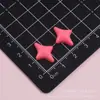 Accesorios de resina de color sólido brillante con forma de estrella de cuatro puntas, materiales DIY de pegamento cremoso para fundas de teléfono, imanes de nevera y accesorios para el cabello