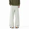 Pantalones casuales de corte estrecho e inclinado para hombre y mujer, con un moderno diseño de remaches, versátiles para el otoño, corte holgado, talla grande, estilo high-street, pantalones de pierna recta