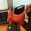 2025 Retro Verano Nueva Moda Casual Simple Color Puro Bolso Dumpling Estilo Extranjero Bolso de Hombro Axilar Brillante Bandolera