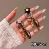 Pinza para el pelo de punto floral vintage de otoño e invierno, pinza lateral para mujer, accesorio para el pelo elegante y sofisticado, pinza para flequillo