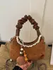 Bolso de mano plisado de lunares retro estilo coreano para mujer, nueva colección otoño 2026, elegante y versátil para el trabajo y el uso diario, bolso de hombro o bolso cruzado