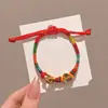 Pulsera de Hilo Rojo de Bebé de Dibujos Animados 2026 Nuevo Estilo Bendición Pequeño Zongzi Pulsera Estilo Chino Festival del Bote del Dragón Hilo de Cinco Colores Ajustable Venta al por Mayor