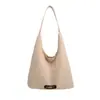 Bolso pequeño de mano de estilo coreano de moda transfronterizo para mujer, nueva colección primavera 2026, bolso de hombro sencillo, estilo para ir al trabajo, y un juego de bolsos a juego