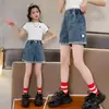 Shorts de Mezclilla para Niñas, Estilo de Verano de Moda, Pantalones para Niños Grandes, Logo de Cara Sonriente Casual de Verano para Niñas al por Mayor, Niños Pequeños y Medianos