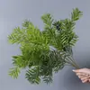 Plantas verdes artificiales en stock, manojos de helecho, hojas de helecho, hierba de helecho para decoración de paredes interiores y diseño de paisajes, césped artificial al por mayor