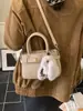 Bolso de Mano Pequeño de Alta Gama Estilo Coreano para Mujer 2026 Nuevo Modelo Bolso de Hombro Retro Sencillo para el Trabajo y los Viajes Diarios Bolso Cruzado de Moda