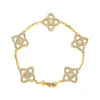 Explosiones del Libro Rojo Estilo Antiguo Medio Pulsera de Trébol de Cuatro Hojas de la Suerte de Cobre y Circonia Flor de Cuatro Hojas Exquisita y Noble Pulsera Galvanizada