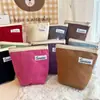 Bolsa de almacenamiento de cosméticos de pana lisa bolsa de almacenamiento de viaje bolsa de almacenamiento diario bolsa de cosméticos simple venta al por mayor de fábrica