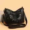 Bolso tote de textura de cuero suave para mujer, nuevo modelo 2026, simple y elegante, bolso versátil para mamá, bolso grande de hombro y cruzado para mujer