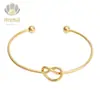 Pulseira de Aço Titânio com Coração Cruzado Amarrado, Simples e Versátil, Pulseira Aberta de Coração de Pêssego da Moda, Pulseira de Aço Inoxidável com Revestimento a Vácuo