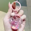 Mini Cabeza de Mickey Botella de Arena Líquida Parpadeante Llavero Colgante para Mochila Llavero de Decoración de Arena Líquida Regalo de Graduación
