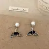 Pendientes Minimalistas de Lujo de Gama Alta Estilo Fresco Corazón de Mariposa de Cristal Negro Diseño de Nicho Moda Versátil