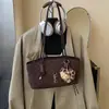 Bolsa Tote Grande Acolchoada de Ombro para Mulheres 2025 Nova de Alta Qualidade Leve Bolsa de Axila Yangshulin Tendência