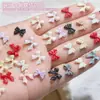 Ins Celebridad de Internet popular resina joyería para uñas al por mayor cinta de color lazo diy corbata de lazo tridimensional accesorios para uñas