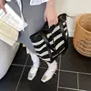 Bolsa de Férias na Praia para Mulheres 2026 Verão Nova Bolsa de Praia Trançada Grande Capacidade Listrada Vazada Versátil Bolsa Tote